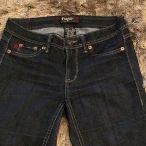 Fragile blue jeans